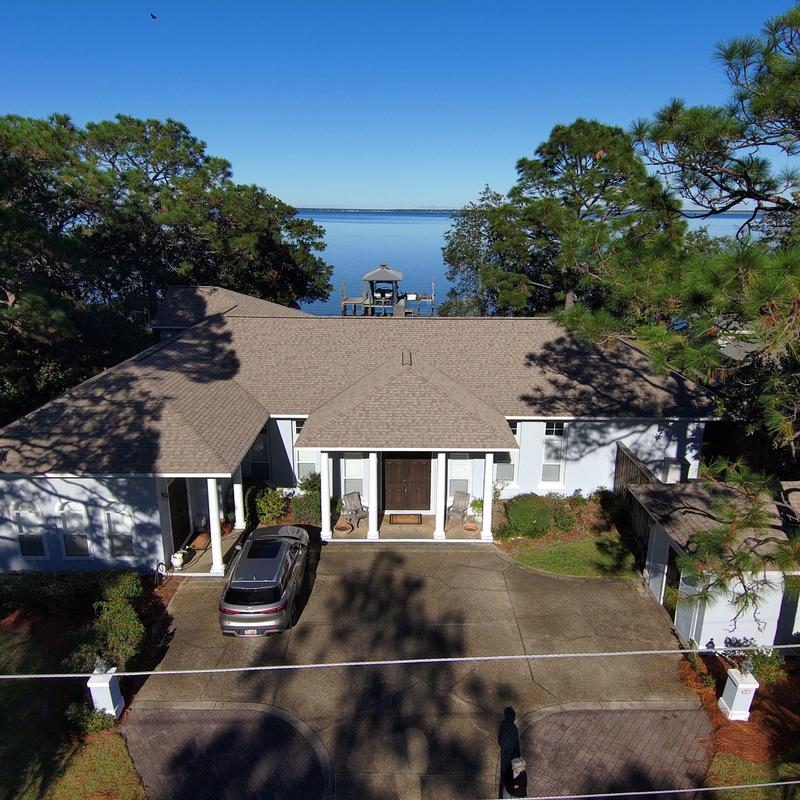 Pine straw removal and yard inspection at lakeside home