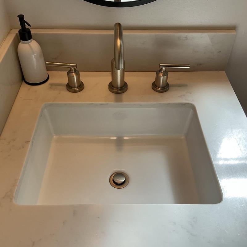 Widespread bathroom faucet and pop-up assembly installation