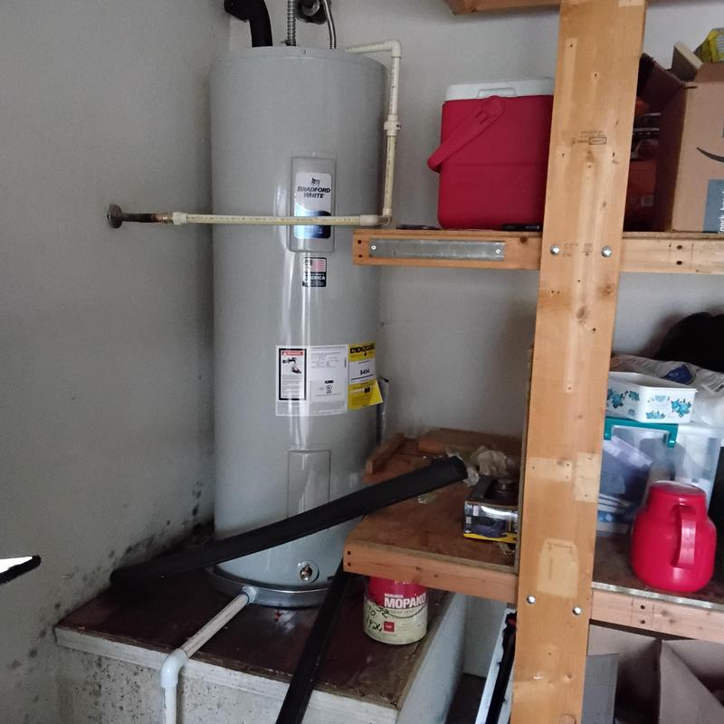 Bradford White water heater in utility room