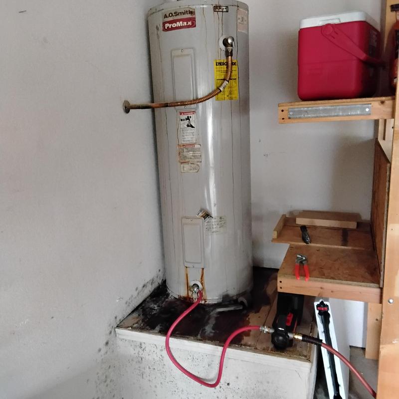 A.O. Smith ProMax water heater with service hose
