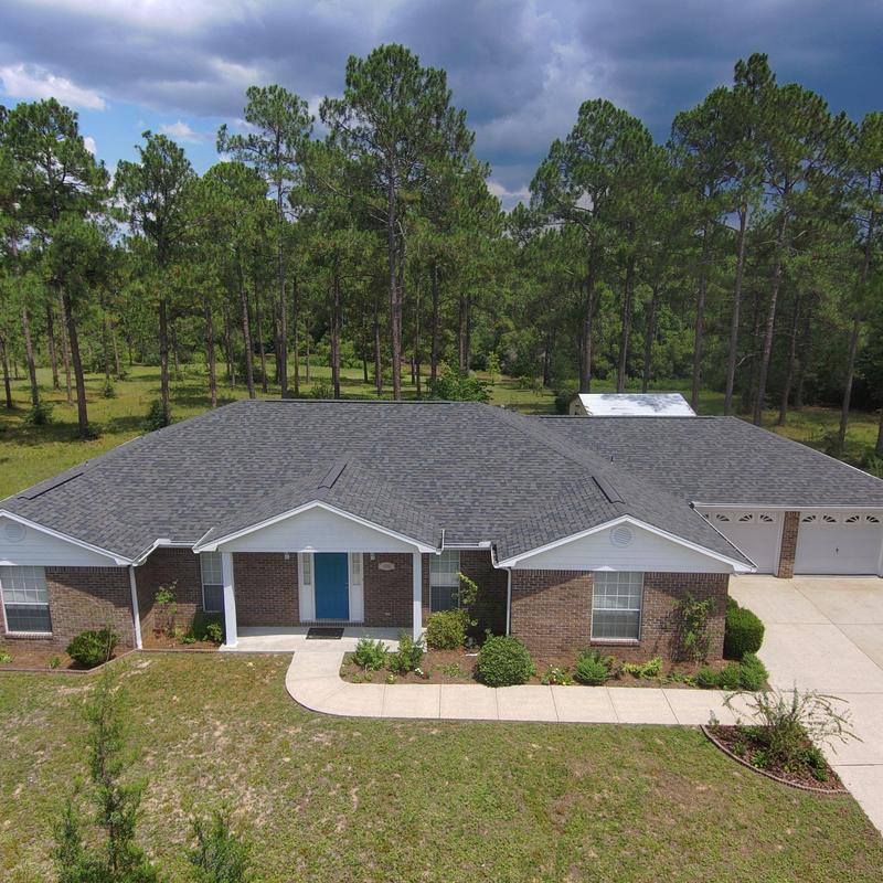 Storm damaged shingle roof with full replacement needed