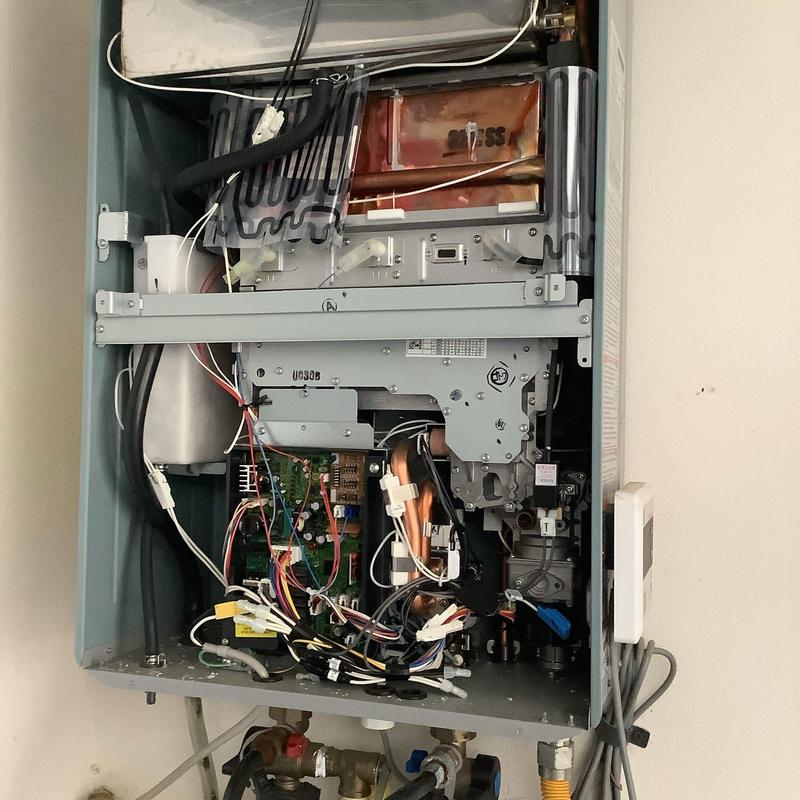 Tankless water heater heat exchanger cleaning