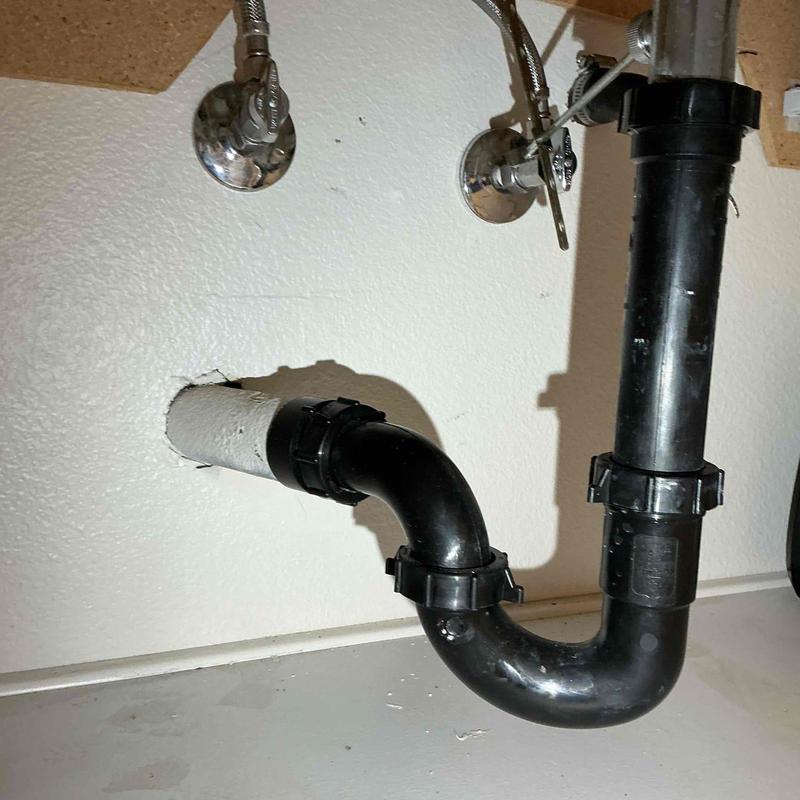 Sink drain trap with supply valves and piping