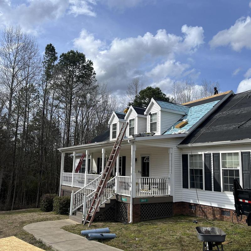 Standing seam metal roof installation with ice shield underlayment