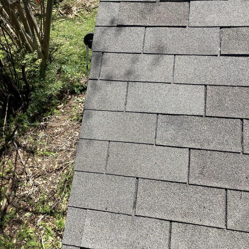 Asphalt shingle roof with repaired patch in Pearland TX
