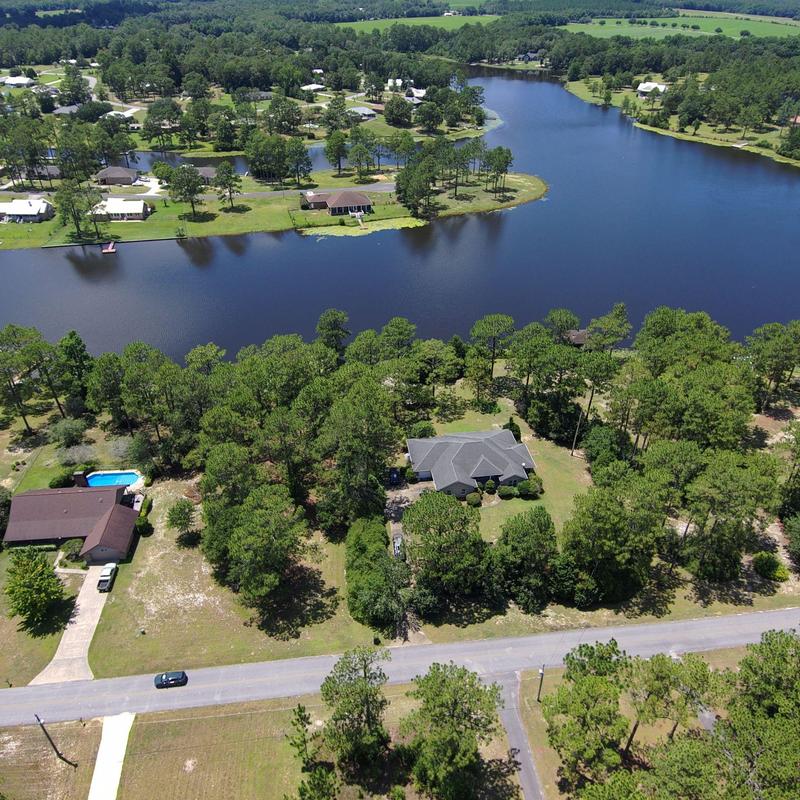 Lakefront residential property aerial view in Defuniak Springs