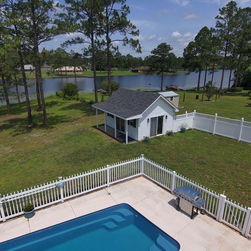 Asphalt shingle roof on poolside guest house