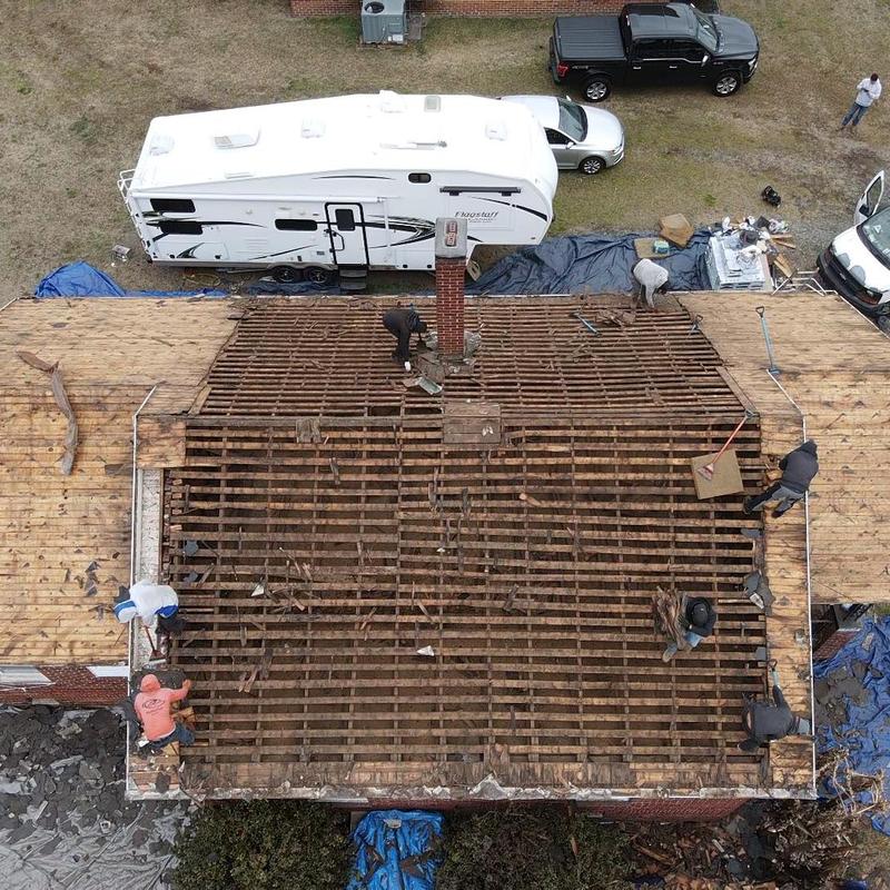 Wood deck replacement on home roof in progress Wood deck replacement on home roof in progress