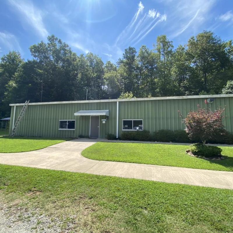 Metal roof panels on commercial building exterior Metal roof panels on commercial building exterior