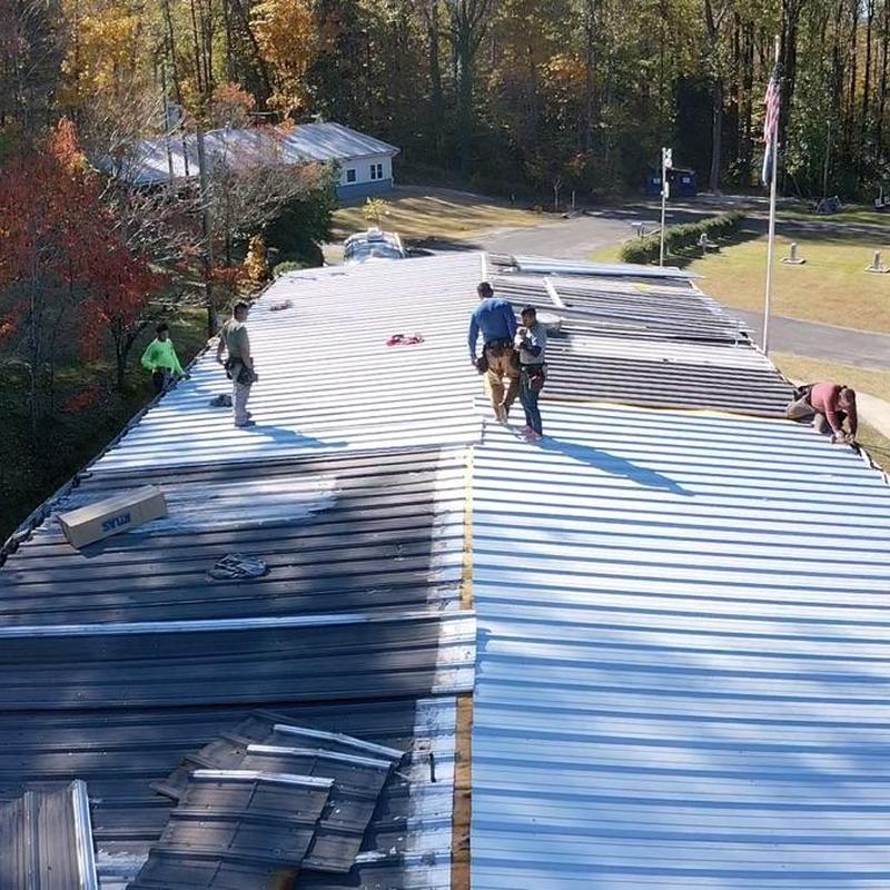 Metal roofing panel replacement with crew on-site Metal roofing panel replacement with crew on-site