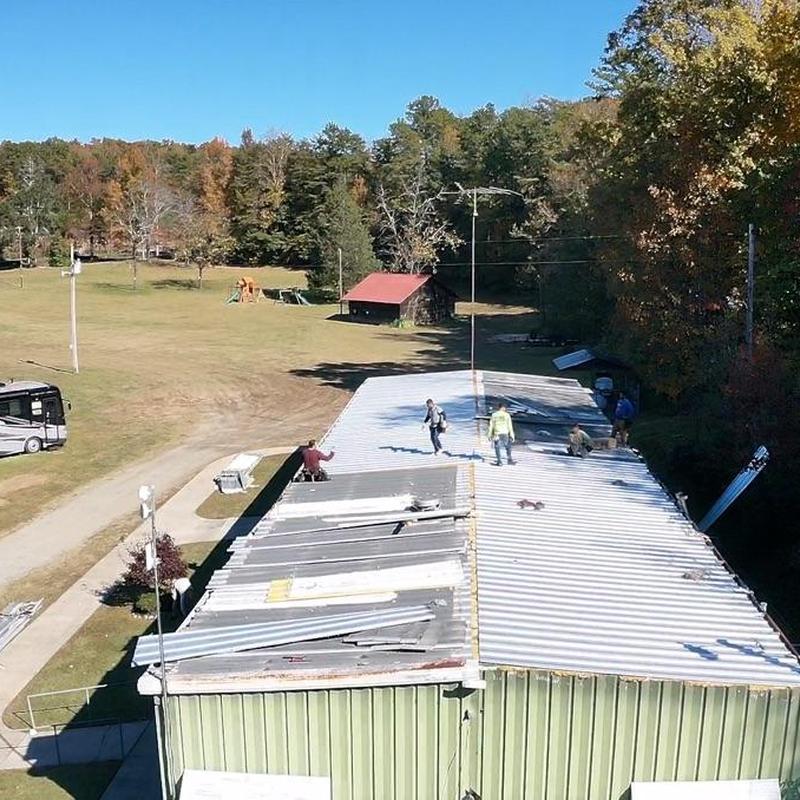 Metal roof panel replacement on commercial building Metal roof panel replacement on commercial building