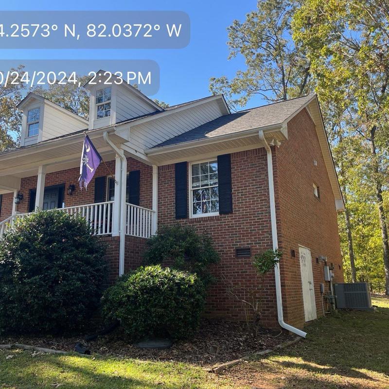 Owens Corning Oakridge roof with gutters on brick home Owens Corning Oakridge roof with gutters on brick home