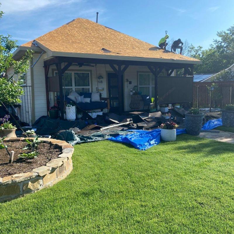 Roof decking replacement with protective tarps in McKinney Roof decking replacement with protective tarps in McKinney
