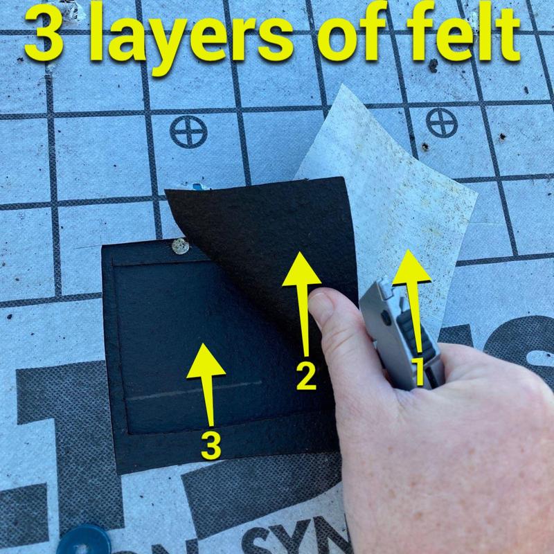 Roofing felt layers peeled back showing three layers Roofing felt layers peeled back showing three layers