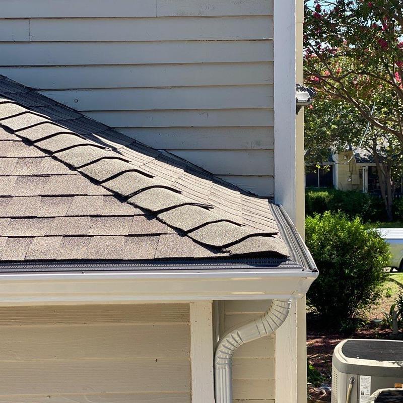 New Wave gutter screens on white gutters