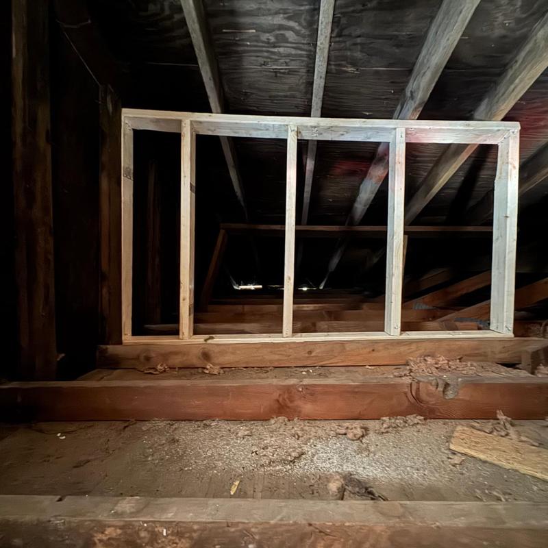 Roof framing stabilization with new wood beams