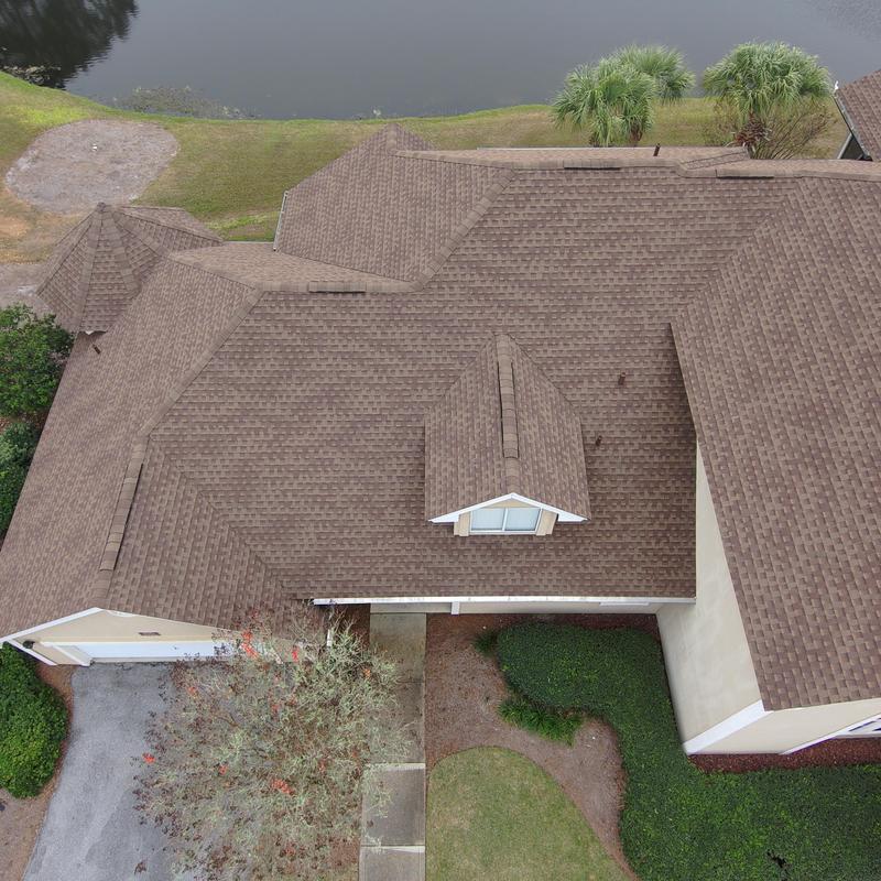 Custom squirrel-proof pipe protectors on roof