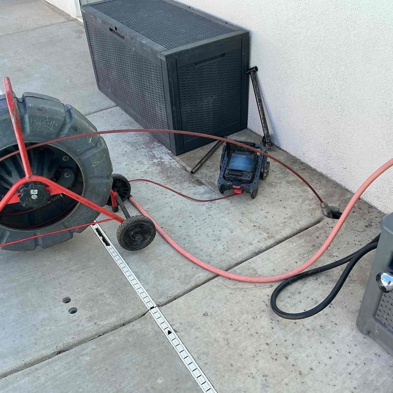 Mainline drain cleaning equipment and inspection camera setup