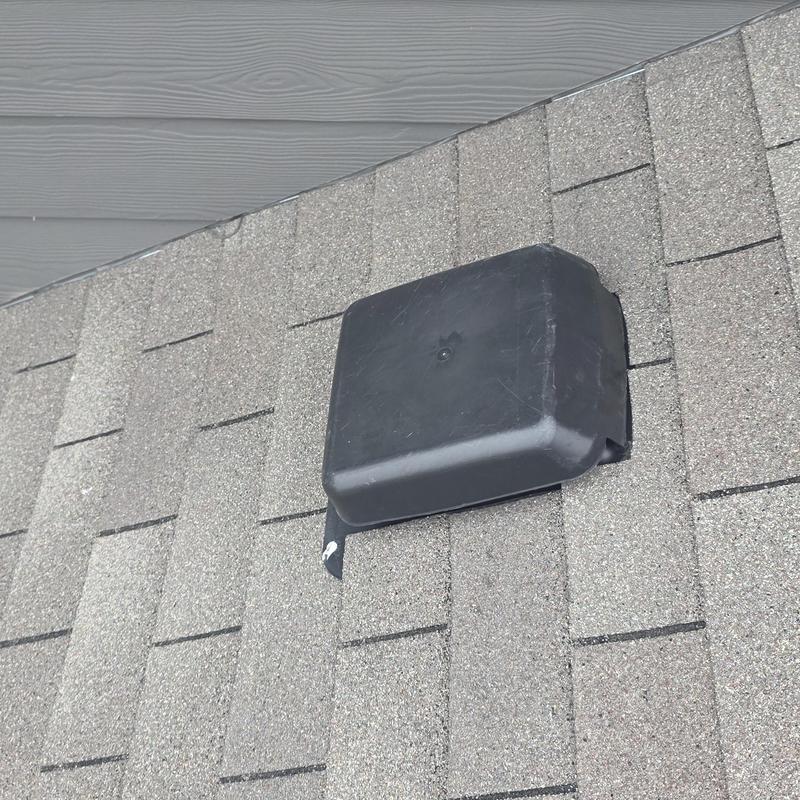 Roof vent cover damaged on asphalt shingle roof