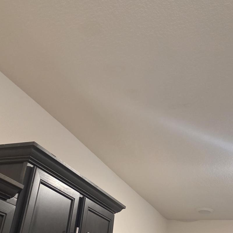 Interior ceiling water damage above cabinets