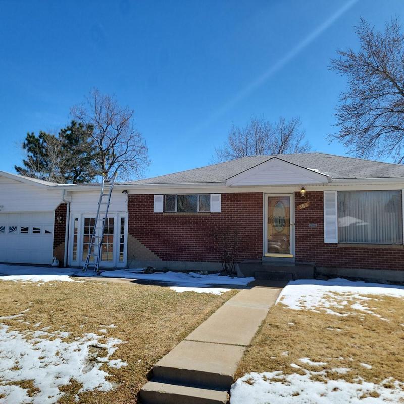 Three-tab shingle roof inspection with ladder in Colorado Three-tab shingle roof inspection with ladder in Colorado