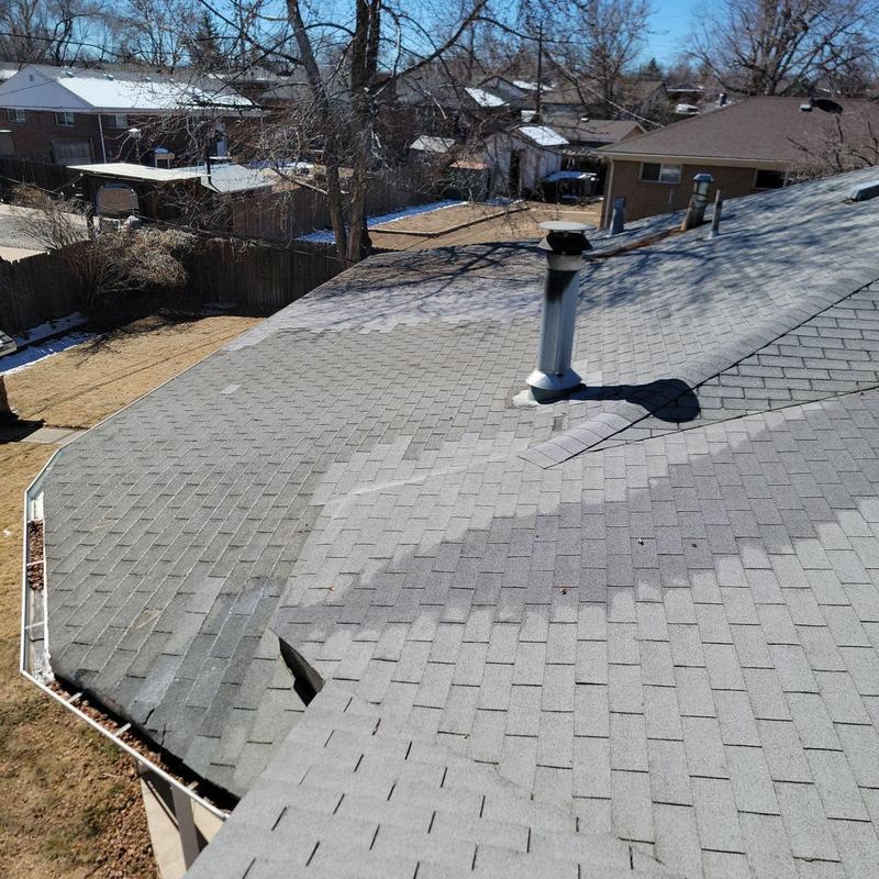 Three-tab shingle roof showing signs of weathering Three-tab shingle roof showing signs of weathering