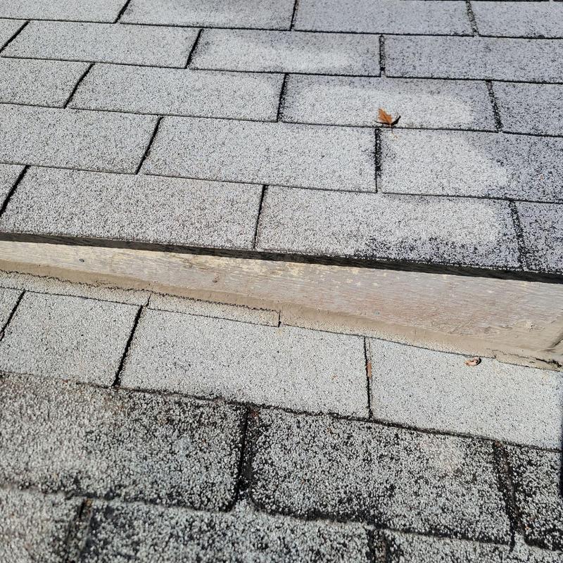 Three tab asphalt shingles with weathering signs Three tab asphalt shingles with weathering signs