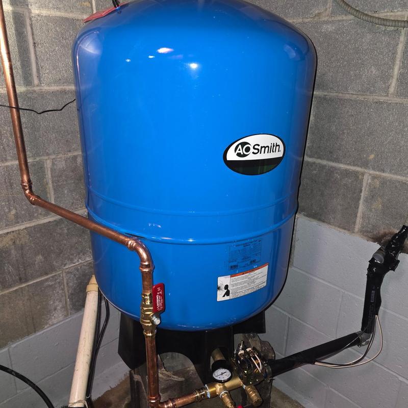 Bladder tank with pressure switch and copper piping