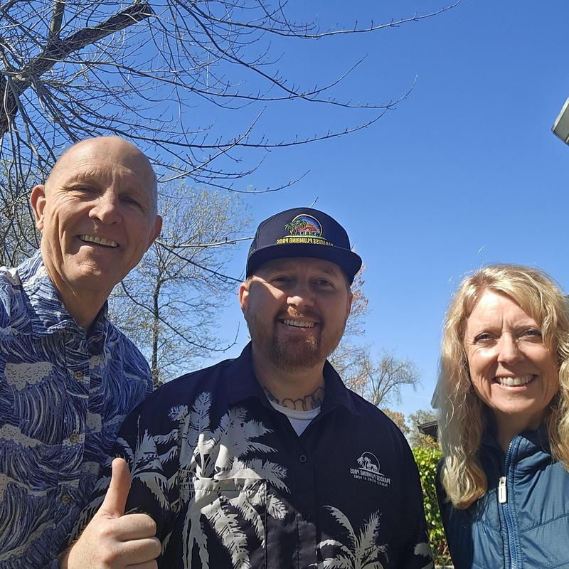 Water lines and air hammer arrestors installation team smiling