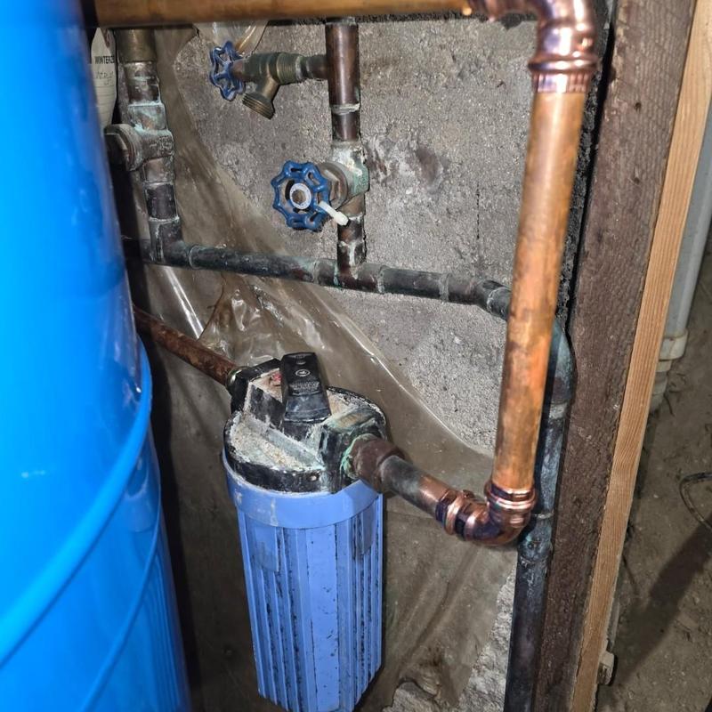 House water filter with copper pipe relocation