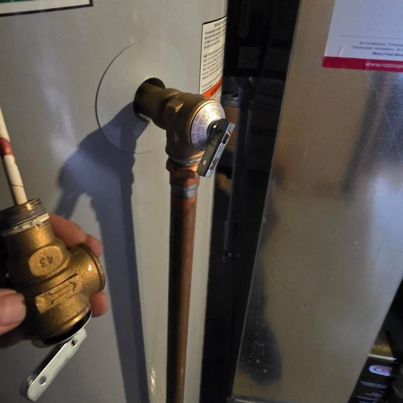 Water heater relief valve replacement near handle