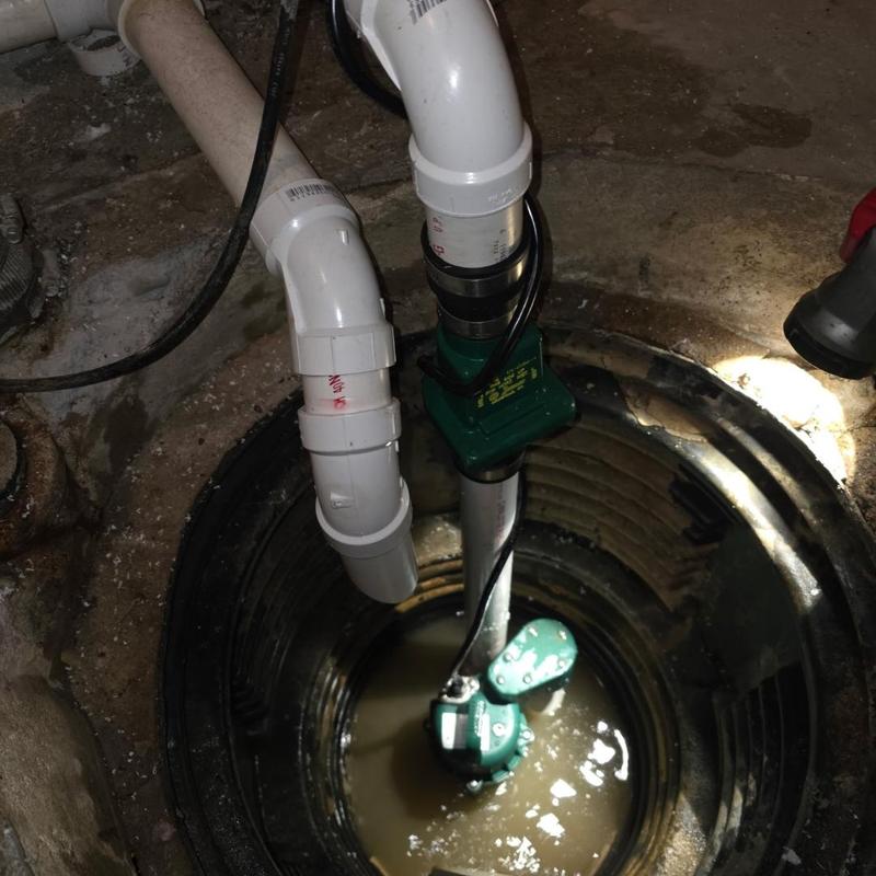 Zoeller sump pump with check valve and PVC discharge