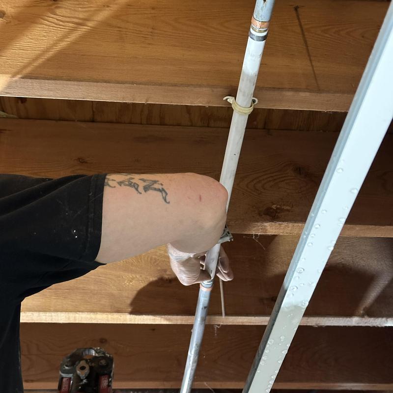 PVC water pipe replacement under wooden floor joists