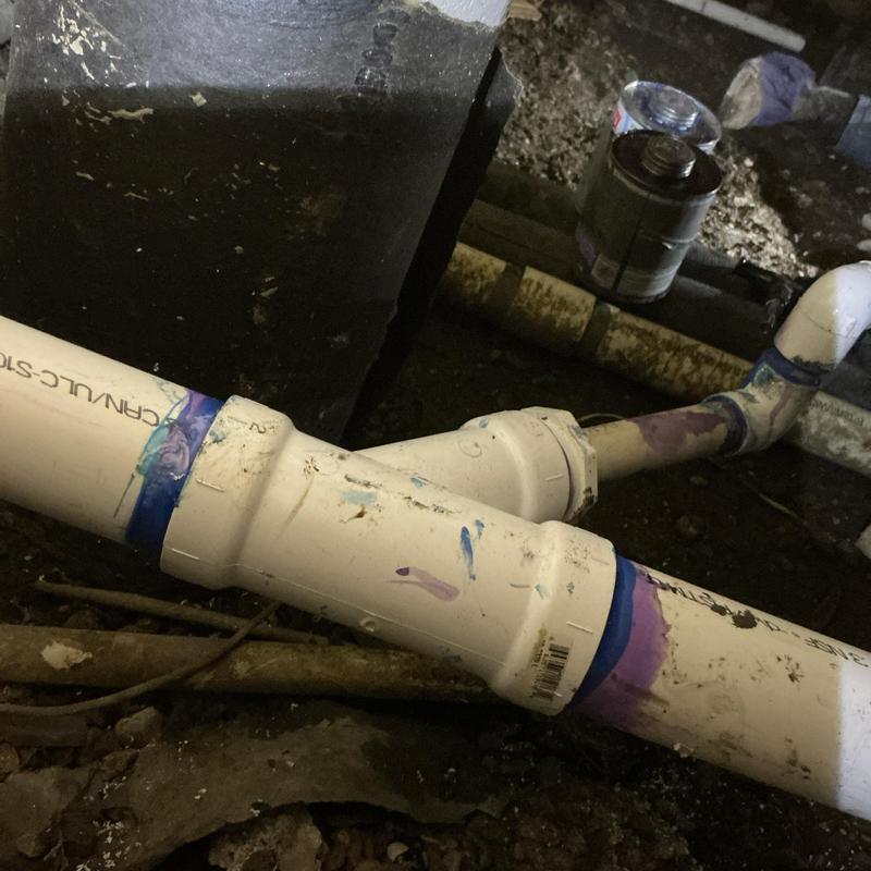 PVC sewer pipe with fittings and purple primer joints PVC sewer pipe with fittings and purple primer joints