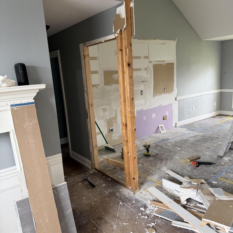 Doorway framing and drywall demolition for kitchen wall