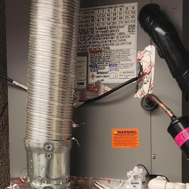 Upflow 5-ton HVAC unit with duct and refrigerant lines