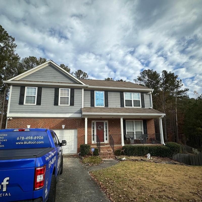 Asphalt shingle roof replacement on two-story home