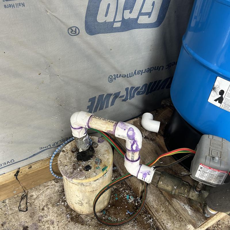 Well pump system filter installation with connected piping