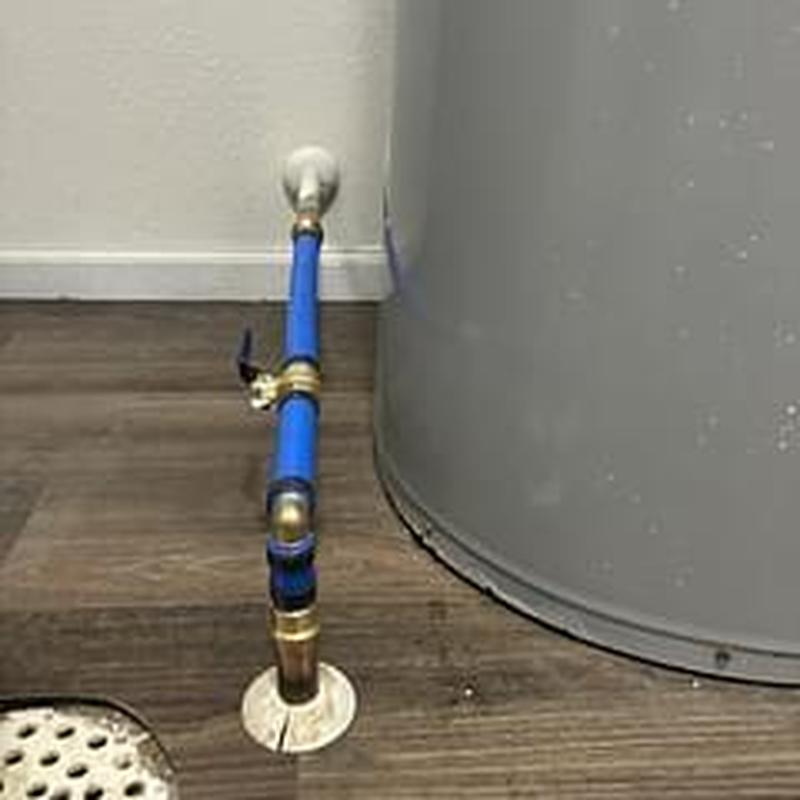 Main water shut off valve with blue piping near water heater