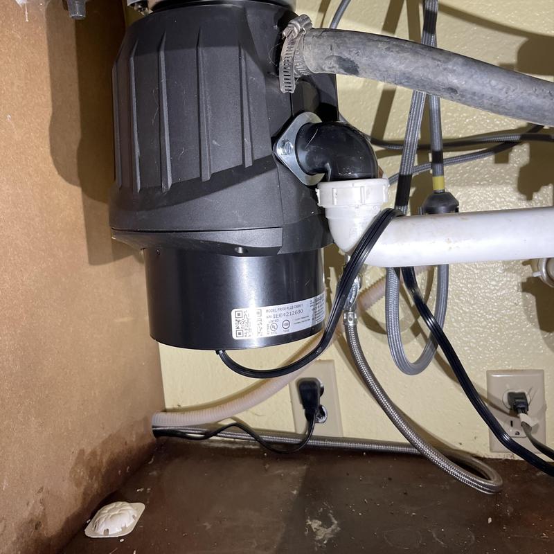 Insinkerator disposal replacement under kitchen sink