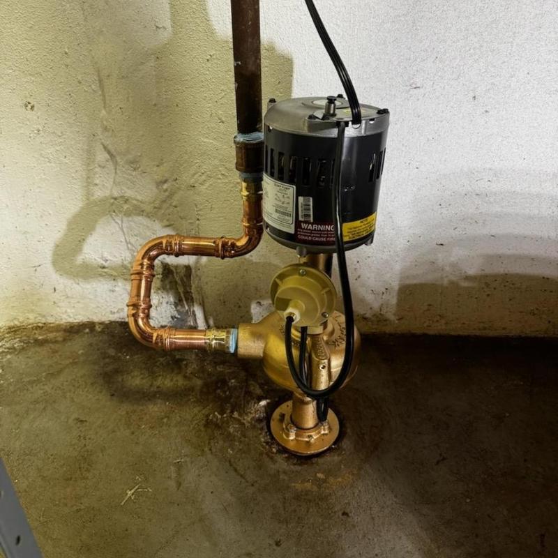 Shellback sump pump with copper piping installation
