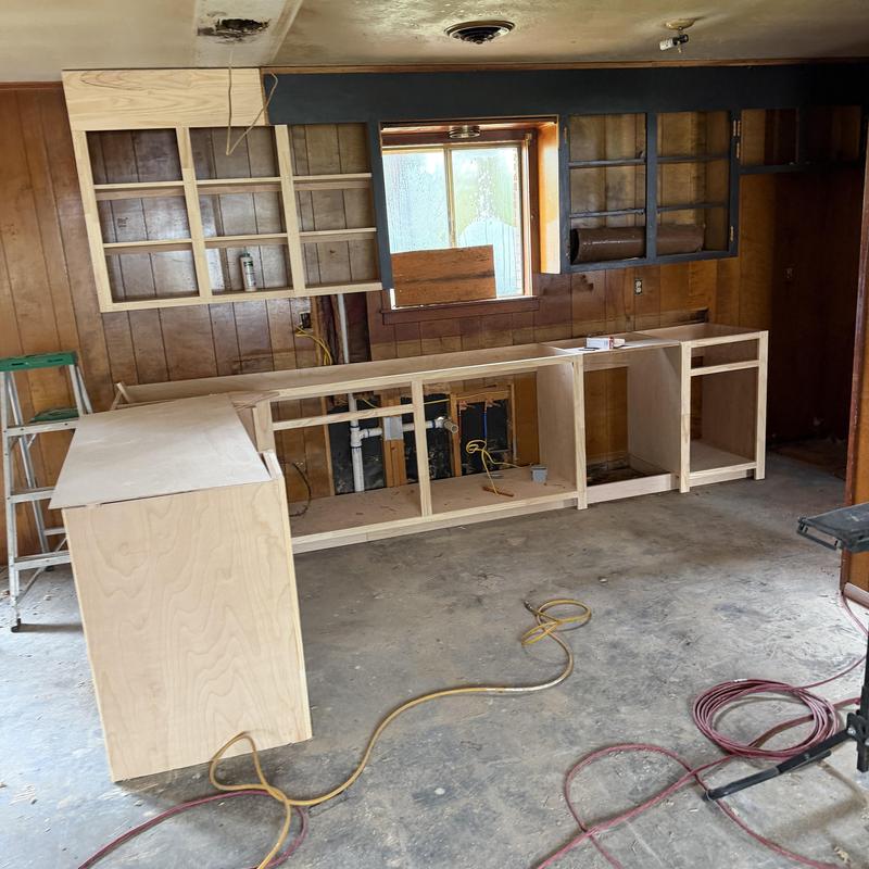 Kitchen cabinet frames installation during remodel in Florence, MS