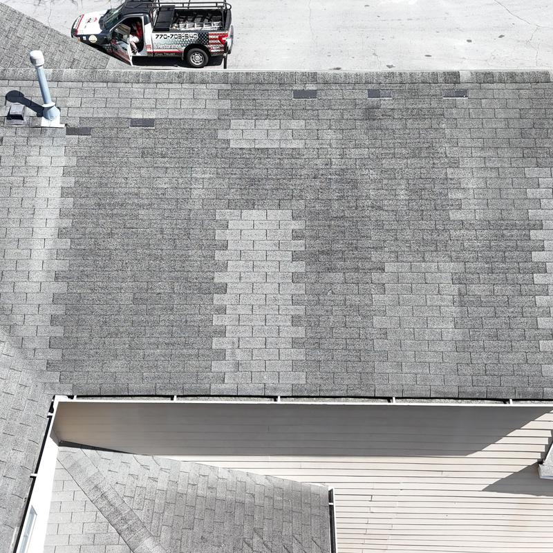 Roof asphalt shingles with missing patches and pipe boot