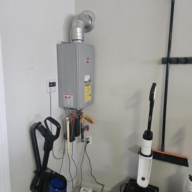 Tankless water heater with diagnostic and coil install