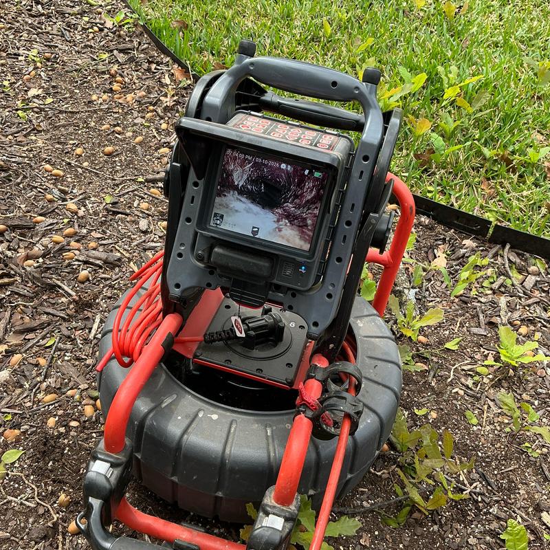 Drain pipe inspection camera showing clog buildup