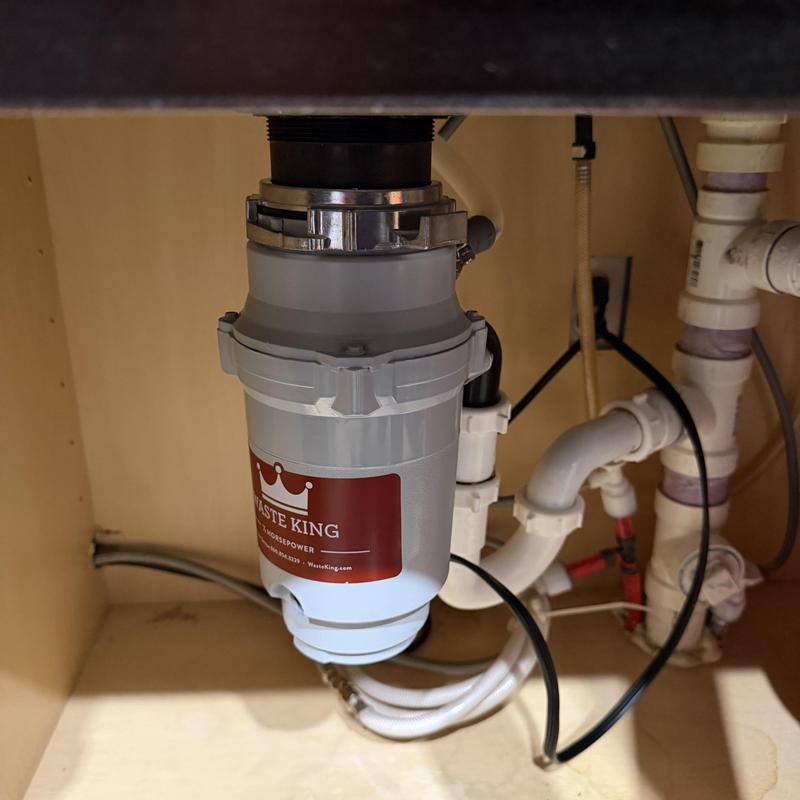 Waste King garbage disposal under sink in Yukon, OK