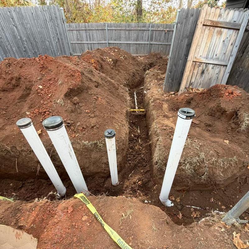Sewer service line trench and vent pipes excavation