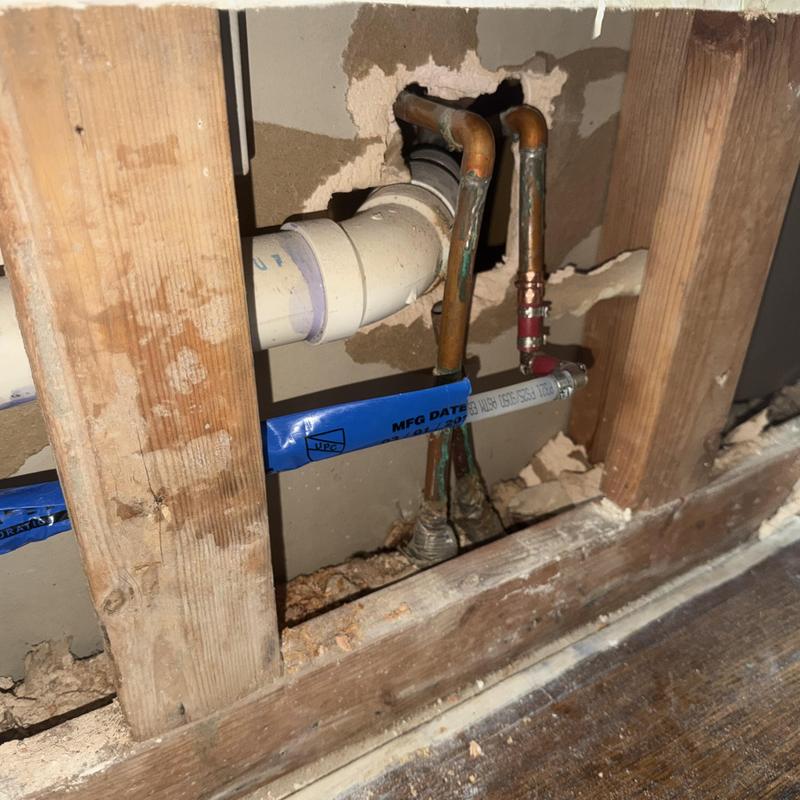 Copper water pipes with reroute and PVC drain line