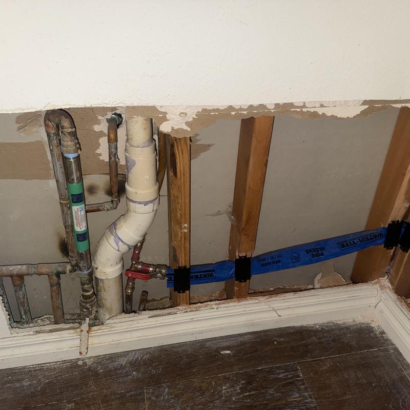 Slab leak reroute plumbing with blue PEX pipe installed