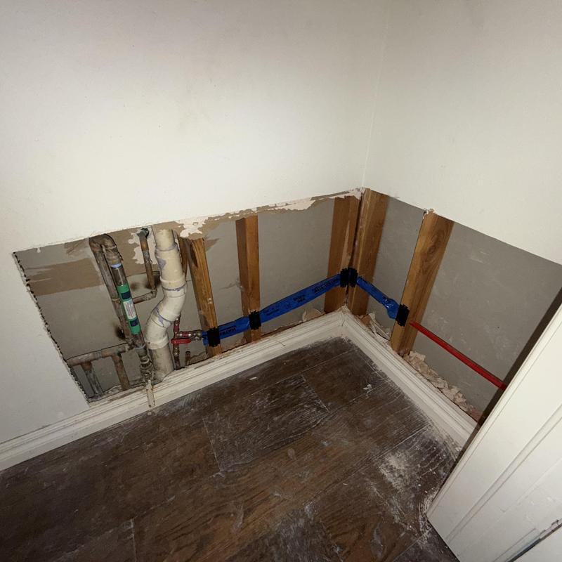 Slab leak reroute with exposed plumbing and pipes